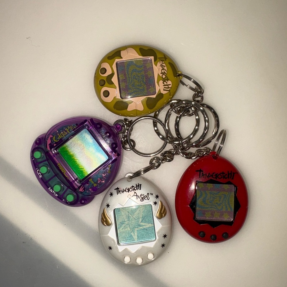 Vintage Tamagotchi Giga Pet Angel 1997 set of 4